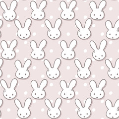 Seamless pattern with cute rabbit muzzles and polka dots