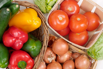 close up of tomatoes, peppers and onions