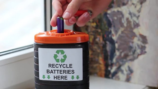 Battery Collection Box. Waste Sorting. The three chasing arrows of the international recycling logo