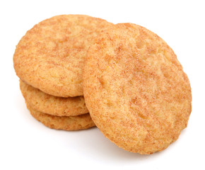 Stack of snickerdoodles over white.