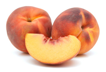 sweet peaches on a white background