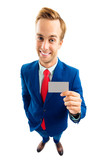 Businessman showing business or plastic card, with copyspace