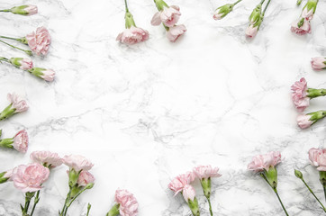 carnations flowers on a marble table