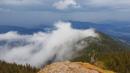 fog into the Ceahlu mountain, Romania