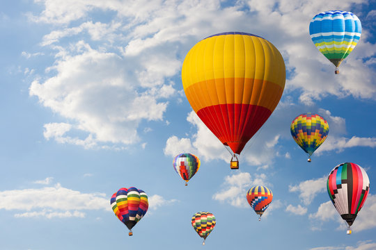 Colorful hot air balloon fly over the blue sky