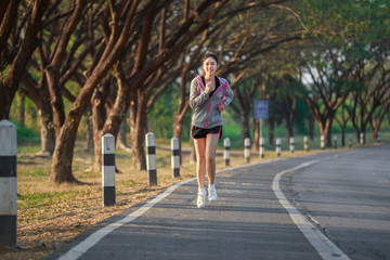 Fototapeta na wymiar fitness woman running in park