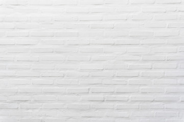 Abstract weathered textured on white brick wall background.