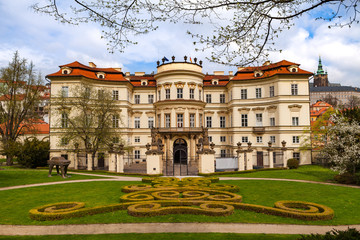 Naklejka premium PRAGUE, CZECH REPUBLIC - APRIL 09, 2017: Lobkowicz Palace and backyard with beautiful gardening. Also German embassy.