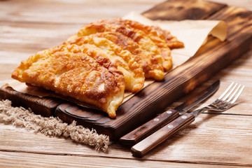 Cheburek, fried pie with meat and onion, traditional turkish and mongolian dish