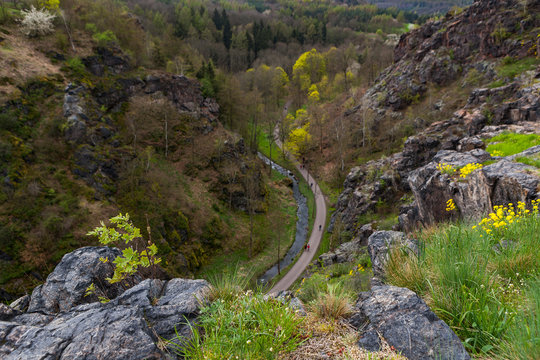 Steep rocks and valley Divoka Sarka in Prague, spring time. Wild nature park in the city.