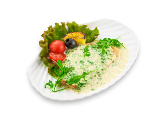 Pancake stuffed with white sauce, decorated with green leaves on a white plate. Clipping path.