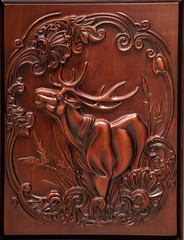 Wooden relief of a deer