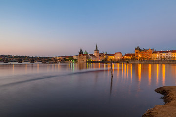 Evening view of illuminated old town and the Charles bridge. Prague, Czech Republic