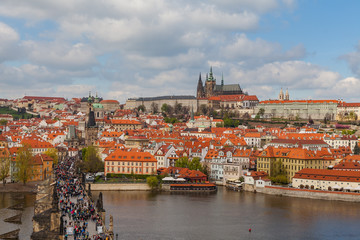 Fototapeta premium Panoramic view of Charles bridge, Prague castle and Vltava river in Prague, Czech Republic