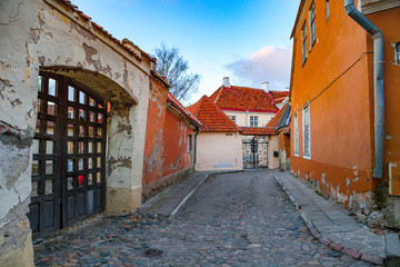 Old Tallinn architecture ensemble. Ancient steet in upper town with pavement.