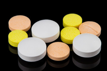 colorful medicine. Pharmacy on black background.