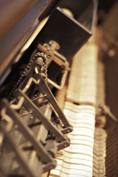 The Inner Mechanism Of A Vintage Automatic Piano. Vertical Close-up Shallow Depth Of Field Shot.
