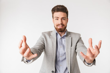 Portrait of an excited young man dressed in shirt