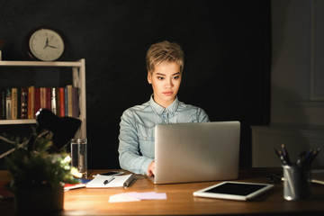 Thoughtful woman at office copy space
