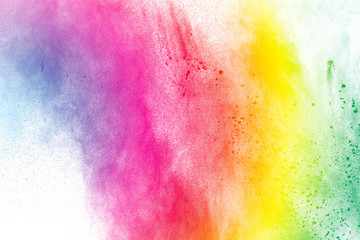The explosion of color powder. Beautiful powder fly away. The cloud of glowing color powder on...