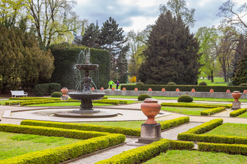 Obraz premium PRAGUE, CZECH REPUBLIC - APRIL, 25, 2017: The Singing Fountain in Kralovska Zahrada the Royal Gardens park in Hradcany. Luxury park style.