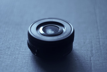 black lens on a blue background, focus