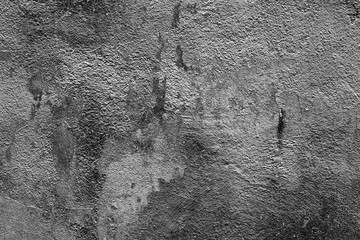 Wall fragment with scratches and cracks