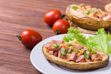 Baked potato with sausage