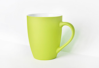 Green mug on white background