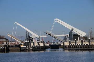 Both doors and bridges open of the Julianasluis in Gouda, the Netherlands