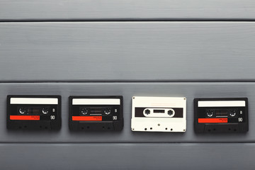 Creative background with audio cassettes of different colors