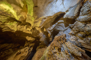 Beautiful illuminated cave formations and stalactites