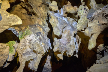 Beautiful illuminated cave formations and stalactites