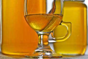 Honey in a cup and jars