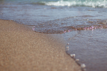 Fototapeta na wymiar water and sand background