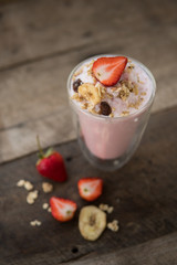 strawberry smoothie and Muesli,summer fresh drink,strawberry yogurt on double wall glass.
