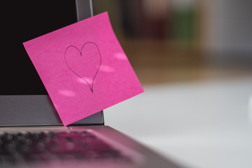 Laptop keyboard with heart note