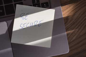 Laptop with note BE SECURE
