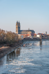 Fototapeta premium Magdeburg downtown during ice drift at Elbe, Germany