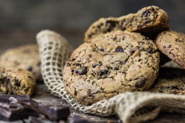 Freshly Baked Chocolate Cookies on Rustic Wooden Table. Sweet Biscuits. Homemade pastry.