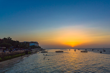 Fototapeta premium Sunset in Stown Town. Zanzibar, Tanzania.