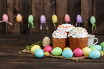Easter cake and Easter eggs (traditional decoration and treats). Happy easter! Copy space.