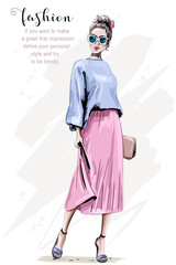 Hand drawn beautiful young woman with handbag. Fashion woman. Stylish cute girl in sunglasses. Sketch.