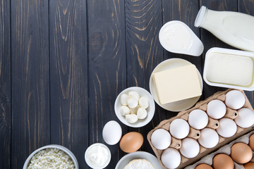 Dairy products on wooden table.