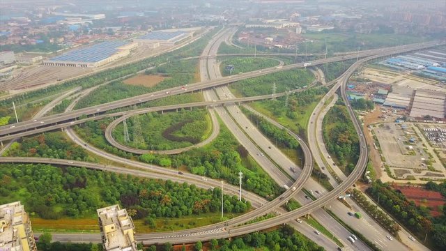 day time wuhan city car and train traffic junction aerial panorama 4k china
