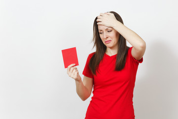 European upset crying shocked young woman, football fan or player in red uniform hold in hand red...