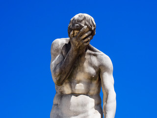 Facepalm (Statue of Cain, by Henri Vidal, Jardin des Tuileries, Paris) - 194350560