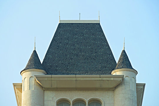 roof of castle ,shoe rooftile on blue sky background ,bottom view