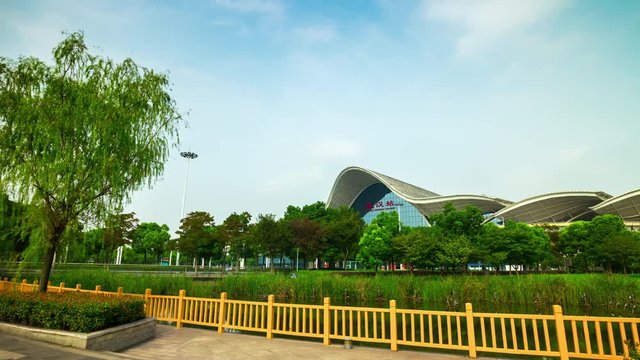 sunny day wuhan city main railway station front park panorama 4k timelapse china
