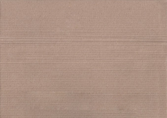 texture of striped brown cardboard paper sheet